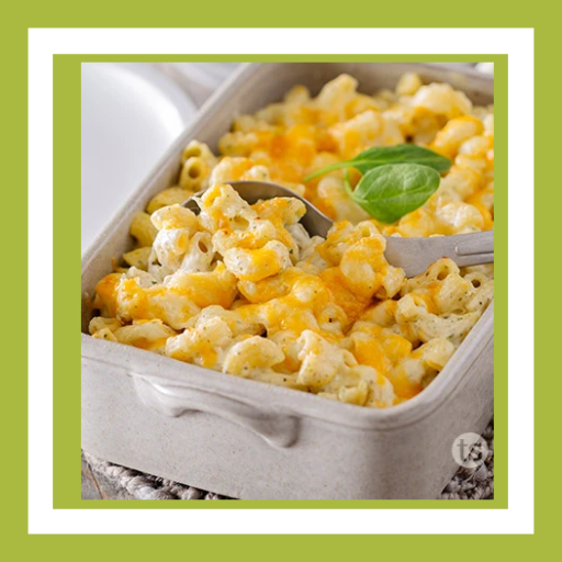 Creamy Artichoke & Spinach Mac and Cheese topped with melted cheese and made with Tastefully Simple Artichoke & Spinach Warm Dip Mix.