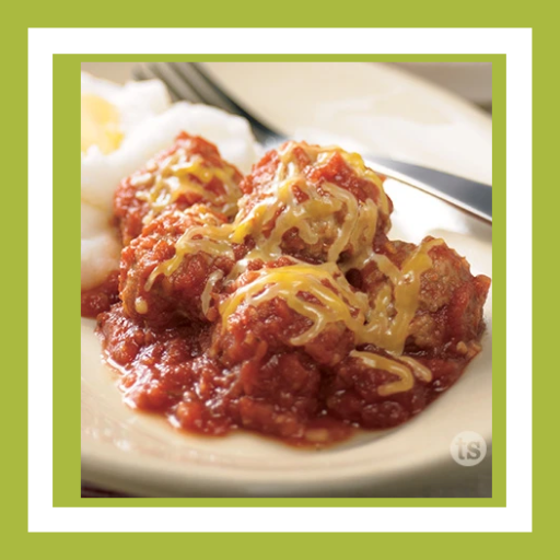 Slow cooker Fiesta Meatballs in a savory tomato sauce topped with melted cheese, an easy weeknight dinner.