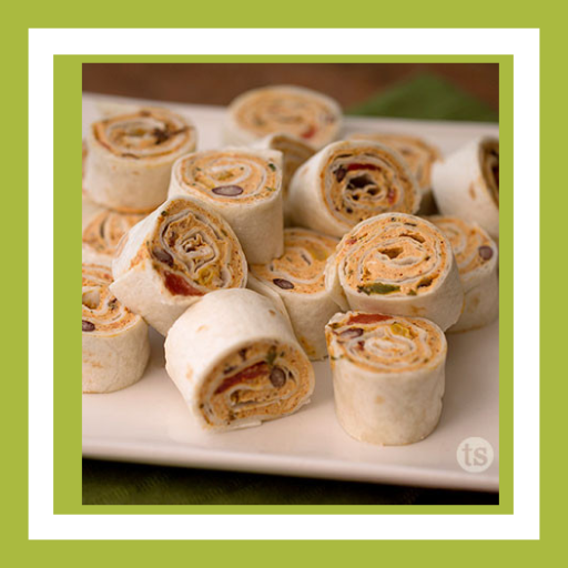 Wahoo Pinwheels made with flour tortillas and a creamy seasoned filling, sliced into bite-sized pieces for an easy football tailgating appetizer.